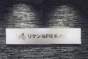 Riken NPR signboard and logo